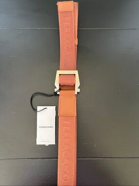 Mens Ferragamo Cognac Ribbed Nylon Belt with Double Silver Square Ring Buckle.